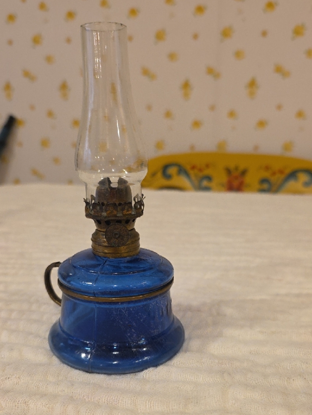Miniature cold balt blue "NUTMEG" finger oil lamp.
